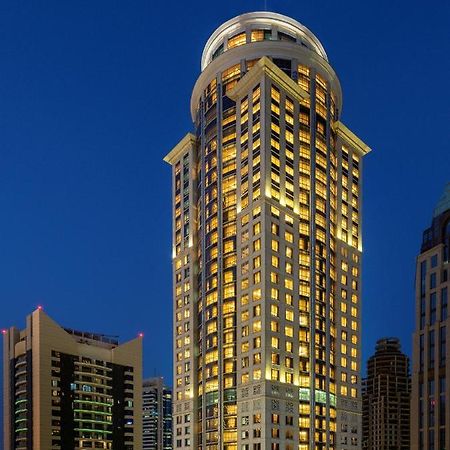 Dusit Hotel & Suites - Ντόχα Εξωτερικό φωτογραφία The hotel at night