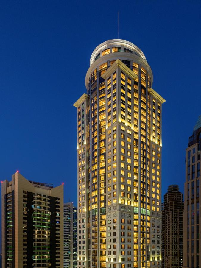 Dusit Hotel & Suites - Ντόχα Εξωτερικό φωτογραφία The hotel at night